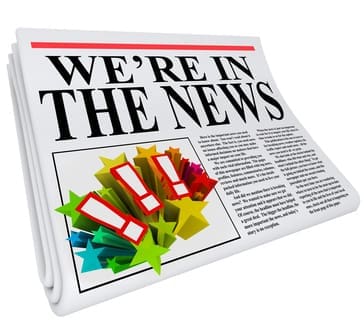 We're in the News Newspaper Headline Article