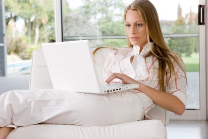 woman reading a compelling blog title