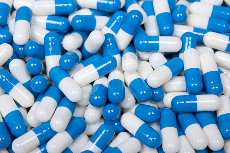 Blue and white pills