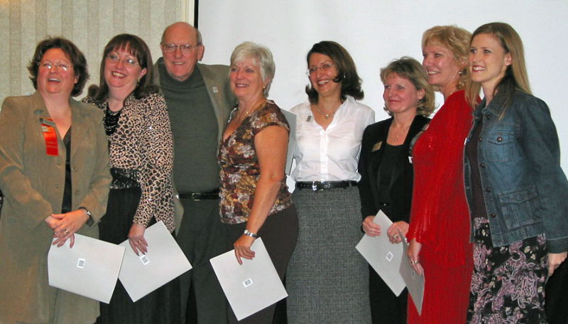 A photo of the first members of Professional Organizers in Canada to receive the Silver Leaf designation.